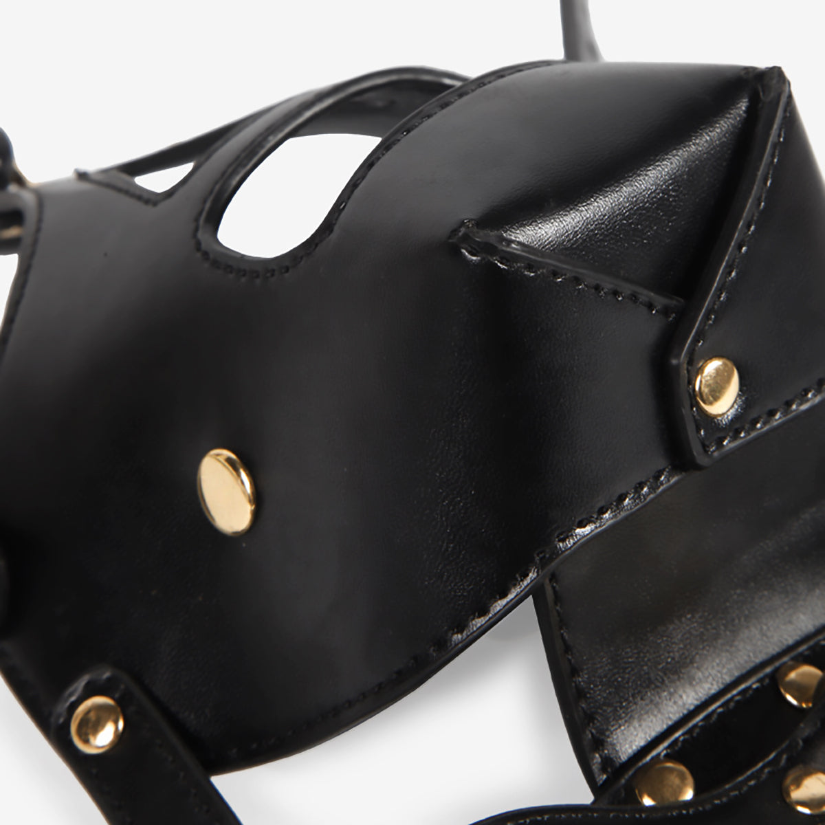 Front view of black vegan leather BDSM bondage muzzle with integrated silicone gag and matching leash by Sexy Maker, adjustable pet play gear.