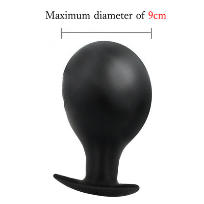 Black expandable inflatable silicone anal plug with detachable air pump for customizable stretching and public play by Sexy Maker.