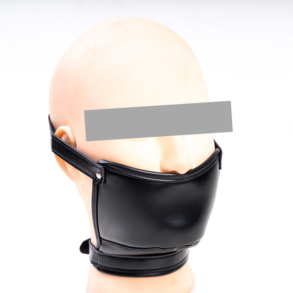 Front view of black vegan leather concealed dildo gag mask with adjustable head and neck straps for oral restraint by Sexy Maker.