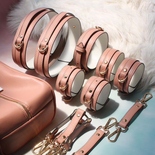 Deep pink vegan leather 7-piece bondage restraint set with gold hardware