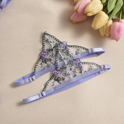 Front view of women's 3-piece lavender floral embroidery lace lingerie set featuring sheer mesh push-up bra and garter belt by Sexy Maker.