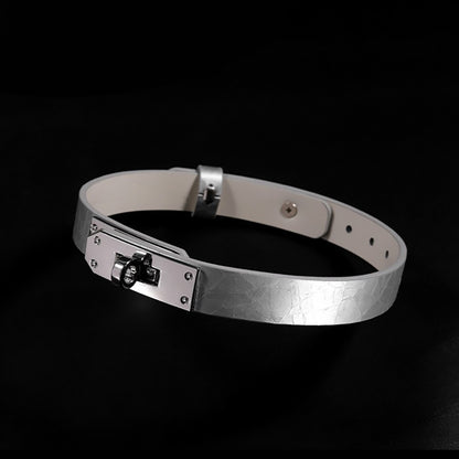 Close-up of premium cracked ice genuine leather BDSM collar featuring a minimalist metal lock plate and matching leash by Sexy Maker.