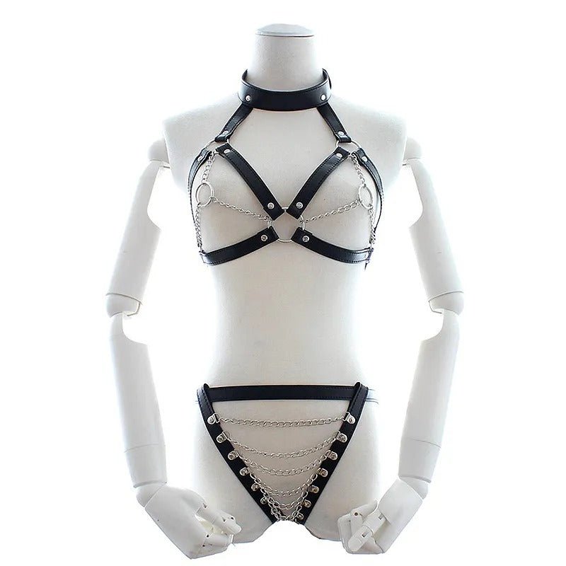 3-piece black leather harness set – top shorts and nipple covers flat lay
