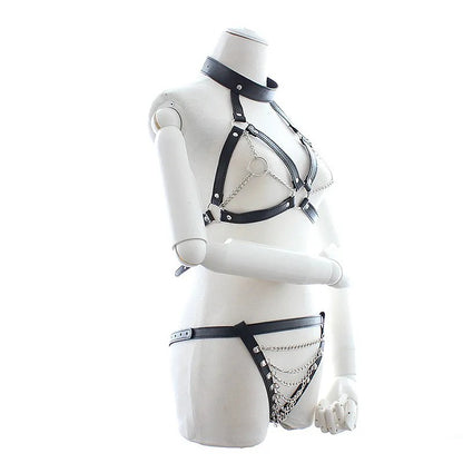 3-piece black leather harness set – top shorts and nipple covers flat lay